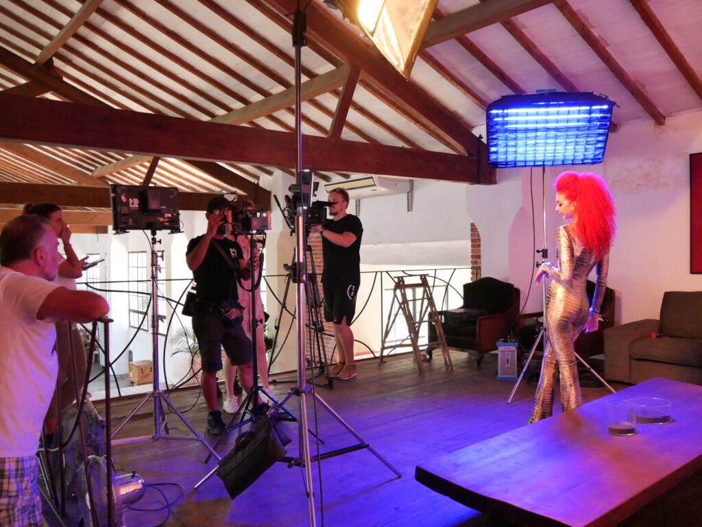 crew with blue lights in a warehouse studio for a Music Video Production Company in Mallorca